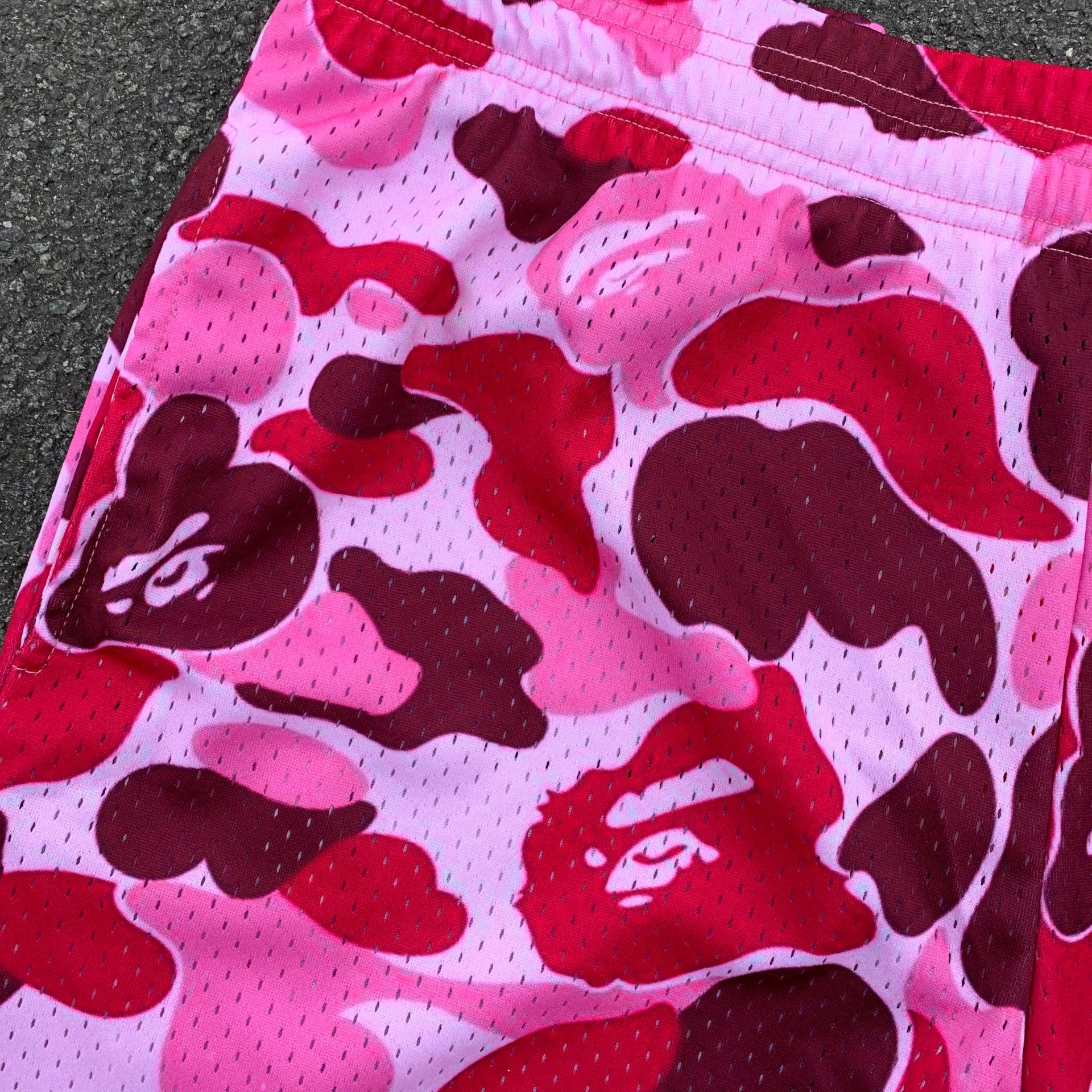 Pink Bape mesh shorts